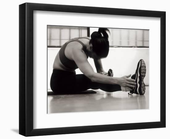 Woman Stretching During a Workout, New York, New York, USA-Paul Sutton-Framed Photographic Print