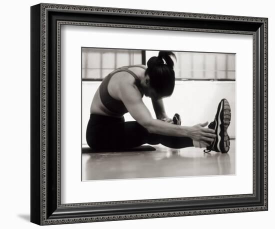 Woman Stretching During a Workout, New York, New York, USA-Paul Sutton-Framed Photographic Print