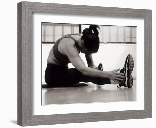 Woman Stretching During a Workout, New York, New York, USA-Paul Sutton-Framed Photographic Print