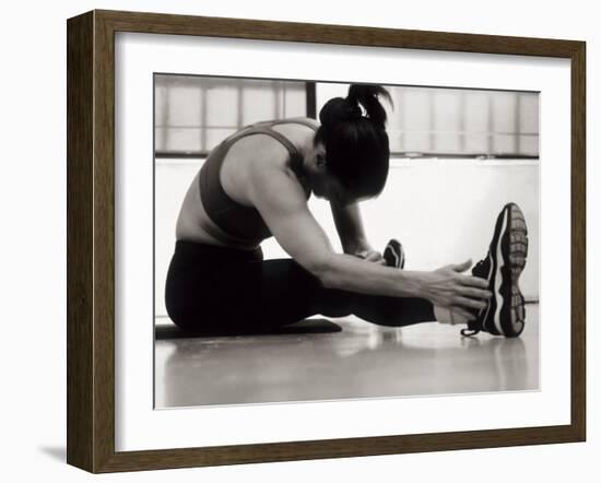 Woman Stretching During a Workout, New York, New York, USA-Paul Sutton-Framed Photographic Print