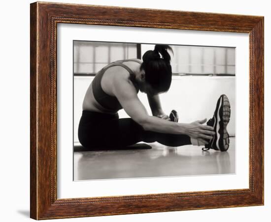 Woman Stretching During a Workout, New York, New York, USA-Paul Sutton-Framed Photographic Print