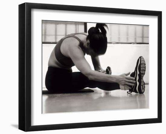 Woman Stretching During a Workout, New York, New York, USA-Paul Sutton-Framed Photographic Print