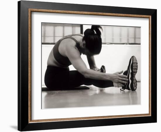 Woman Stretching During a Workout, New York, New York, USA-Paul Sutton-Framed Photographic Print