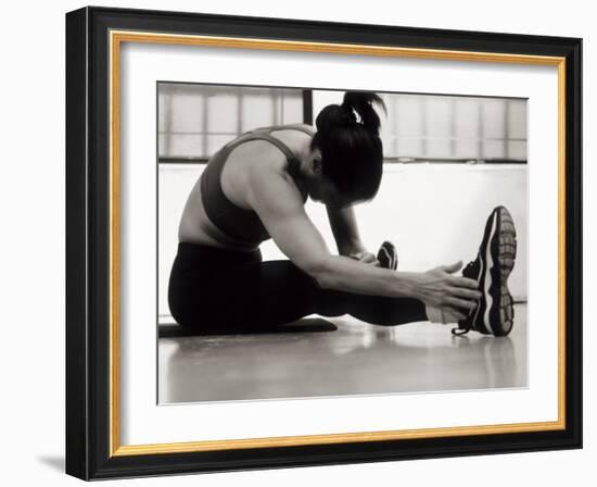 Woman Stretching During a Workout, New York, New York, USA-Paul Sutton-Framed Photographic Print