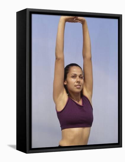 Woman Stretching Outdoors, New York, New York, USA-Chris Trotman-Framed Premier Image Canvas