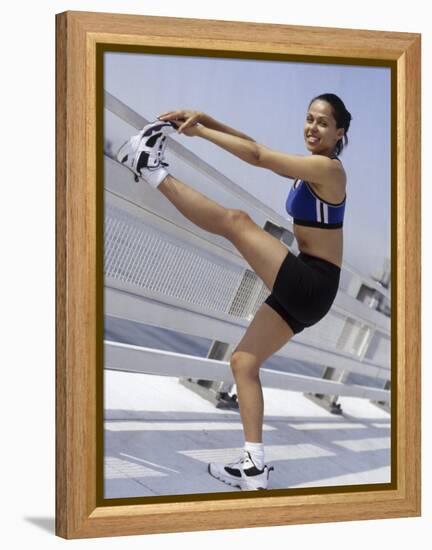 Woman Stretching Outdoors, New York, New York, USA-Chris Trotman-Framed Premier Image Canvas