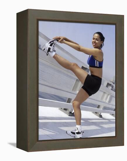 Woman Stretching Outdoors, New York, New York, USA-Chris Trotman-Framed Premier Image Canvas