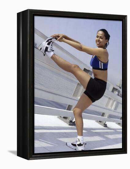 Woman Stretching Outdoors, New York, New York, USA-Chris Trotman-Framed Premier Image Canvas