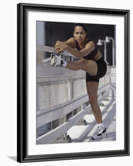 Woman Stretching Outdoors, New York, New York, USA-Chris Trotman-Framed Photographic Print