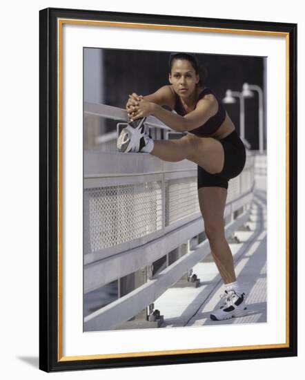 Woman Stretching Outdoors, New York, New York, USA-Chris Trotman-Framed Photographic Print