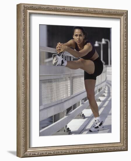 Woman Stretching Outdoors, New York, New York, USA-Chris Trotman-Framed Photographic Print