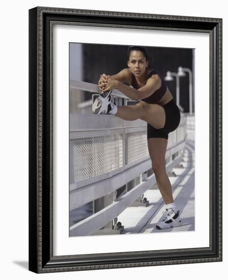 Woman Stretching Outdoors, New York, New York, USA-Chris Trotman-Framed Photographic Print