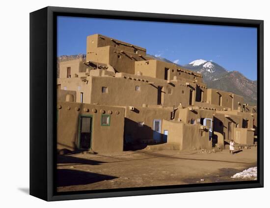 Woman Sweeping Up, in Front of the Adobe Buildings, Dating from 1450, Taos Pueblo, New Mexico, USA-Westwater Nedra-Framed Premier Image Canvas