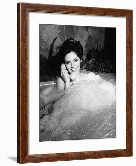 Woman Talking on Phone in Bubble Bath-null-Framed Photo