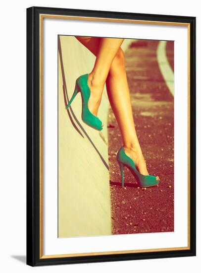 Woman Tan Legs In High Heel Green Shoes Outdoor Shot Summer Day-coka-Framed Art Print