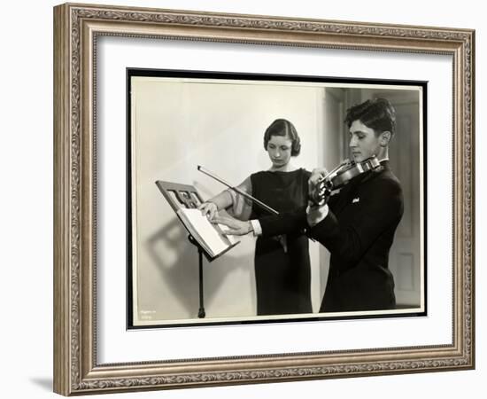 Woman Teaching a Blind Young Man to Play the Violin at the New York Associa-Byron Company-Framed Giclee Print