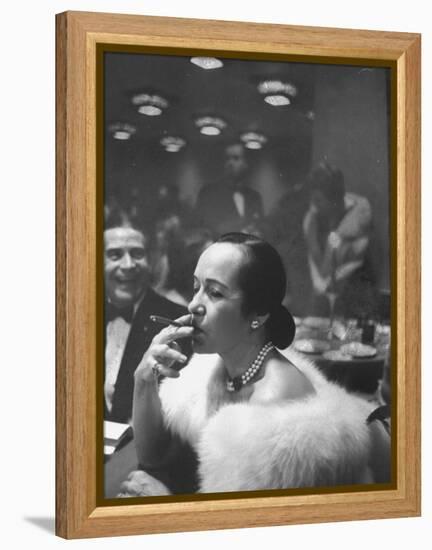 Woman Tries Lady's Cigar in Club After Release of Surgeon General's Report on Smoking Hazards-Ralph Morse-Framed Premier Image Canvas