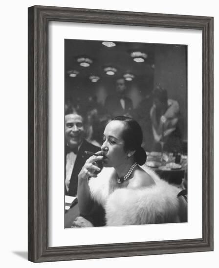 Woman Tries Lady's Cigar in Club After Release of Surgeon General's Report on Smoking Hazards-Ralph Morse-Framed Photographic Print