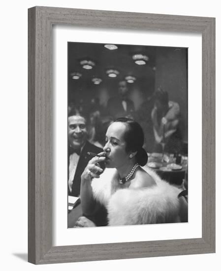 Woman Tries Lady's Cigar in Club After Release of Surgeon General's Report on Smoking Hazards-Ralph Morse-Framed Photographic Print