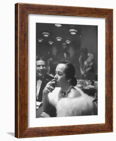 Woman Tries Lady's Cigar in Club After Release of Surgeon General's Report on Smoking Hazards-Ralph Morse-Framed Photographic Print