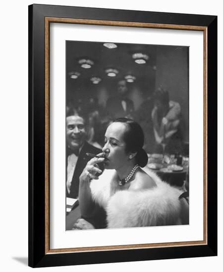 Woman Tries Lady's Cigar in Club After Release of Surgeon General's Report on Smoking Hazards-Ralph Morse-Framed Photographic Print