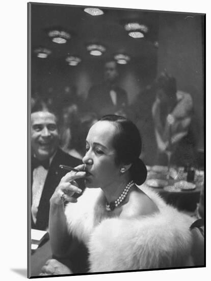 Woman Tries Lady's Cigar in Club After Release of Surgeon General's Report on Smoking Hazards-Ralph Morse-Mounted Photographic Print