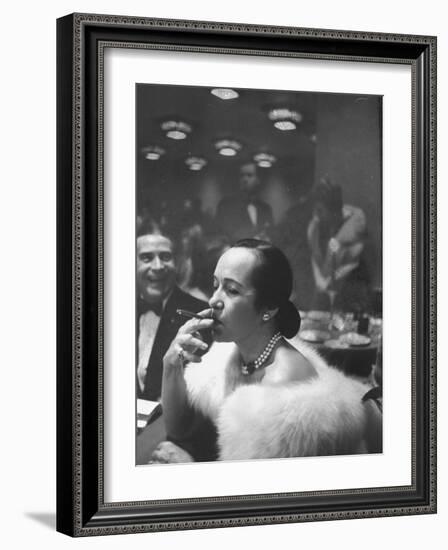 Woman Tries Lady's Cigar in Club After Release of Surgeon General's Report on Smoking Hazards-Ralph Morse-Framed Photographic Print