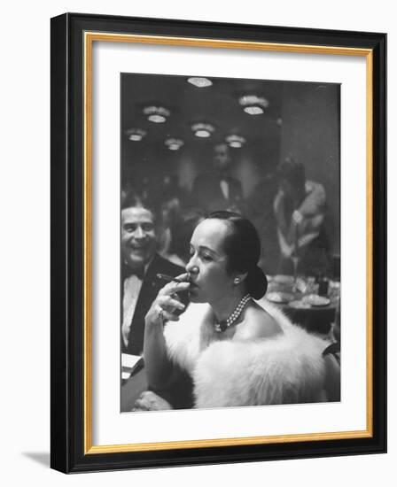 Woman Tries Lady's Cigar in Club After Release of Surgeon General's Report on Smoking Hazards-Ralph Morse-Framed Photographic Print