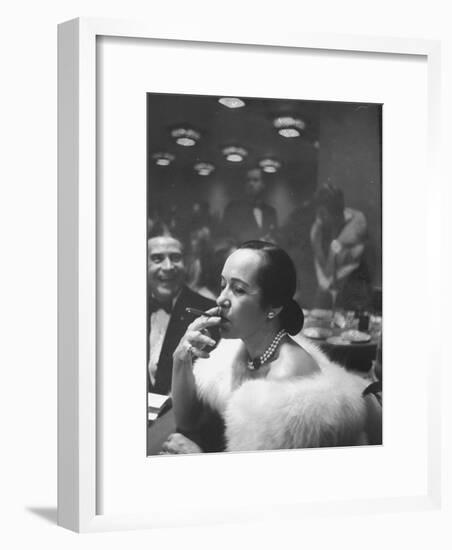 Woman Tries Lady's Cigar in Club After Release of Surgeon General's Report on Smoking Hazards-Ralph Morse-Framed Photographic Print