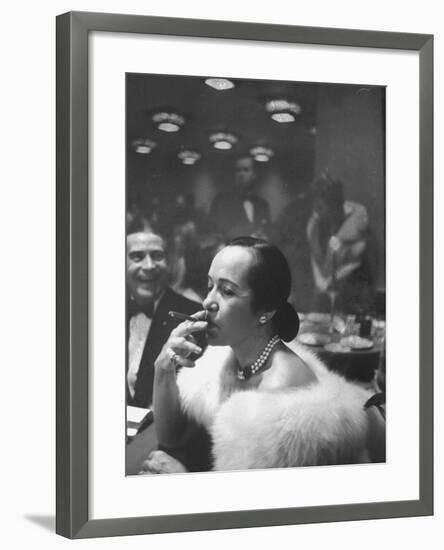 Woman Tries Lady's Cigar in Club After Release of Surgeon General's Report on Smoking Hazards-Ralph Morse-Framed Photographic Print