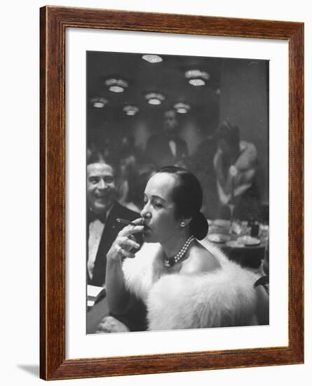 Woman Tries Lady's Cigar in Club After Release of Surgeon General's Report on Smoking Hazards-Ralph Morse-Framed Photographic Print