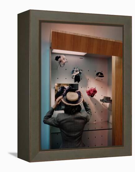 Woman Trying on Hats-Alfred Eisenstaedt-Framed Premier Image Canvas