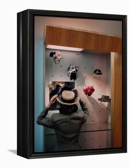 Woman Trying on Hats-Alfred Eisenstaedt-Framed Premier Image Canvas