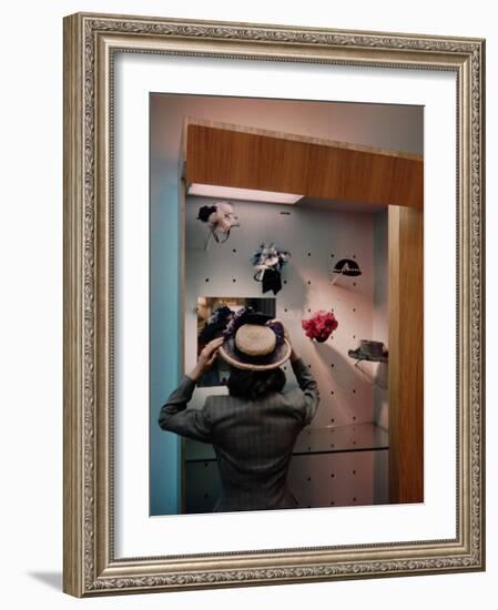 Woman Trying on Hats-Alfred Eisenstaedt-Framed Photographic Print