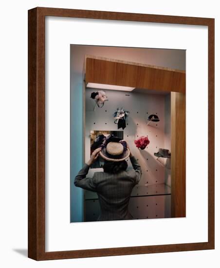 Woman Trying on Hats-Alfred Eisenstaedt-Framed Photographic Print