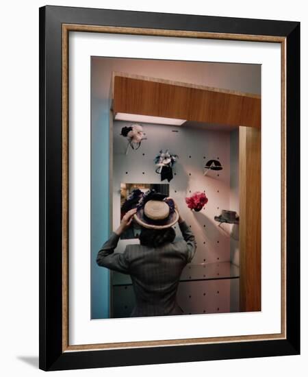 Woman Trying on Hats-Alfred Eisenstaedt-Framed Photographic Print