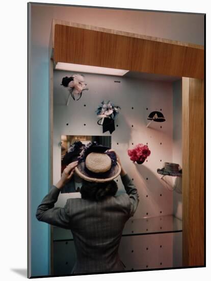 Woman Trying on Hats-Alfred Eisenstaedt-Mounted Photographic Print