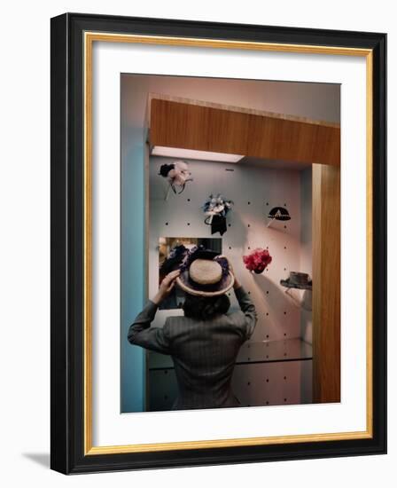 Woman Trying on Hats-Alfred Eisenstaedt-Framed Photographic Print