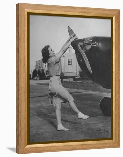 Woman Turning Propeller to Start Plane-David Scherman-Framed Premier Image Canvas