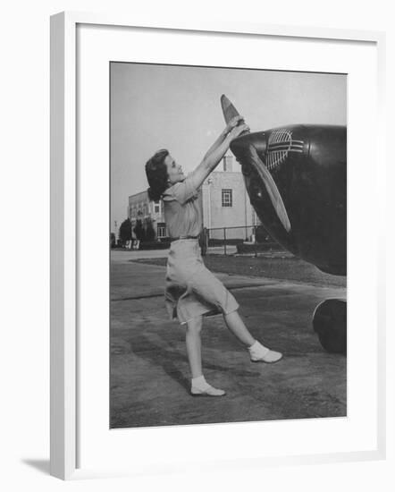 Woman Turning Propeller to Start Plane-David Scherman-Framed Photographic Print