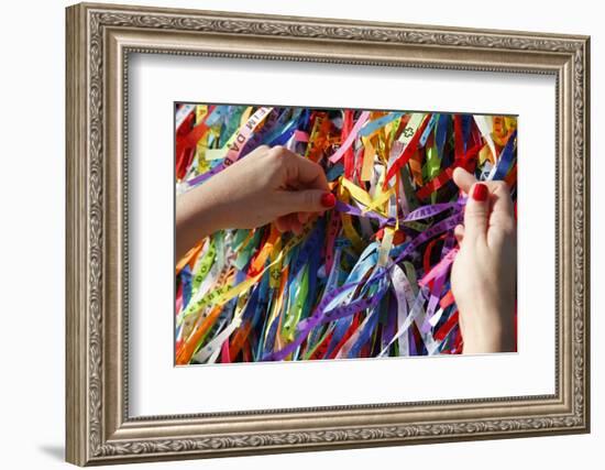 Woman Tying Lucky Ribbon at Igreja Nosso Senhor do Bonfim Church, Salvador, Bahia, Brazil-Yadid Levy-Framed Photographic Print