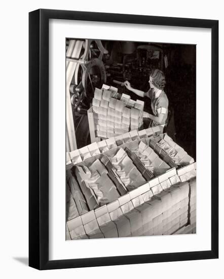 Woman Typing Up Bundles of Paper Bags as They are by Machine Inthe Union Bag and Paper Co. Factory-Margaret Bourke-White-Framed Photographic Print