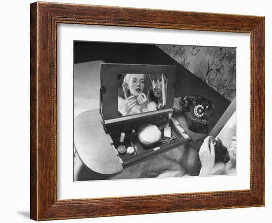 Woman Using a Swing Table to Put on Her Make-Up-Bernard Hoffman-Framed Photographic Print