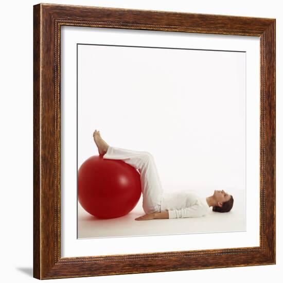 Woman Using An Exercise Ball-Cristina-Framed Premium Photographic Print