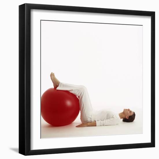 Woman Using An Exercise Ball-Cristina-Framed Premium Photographic Print