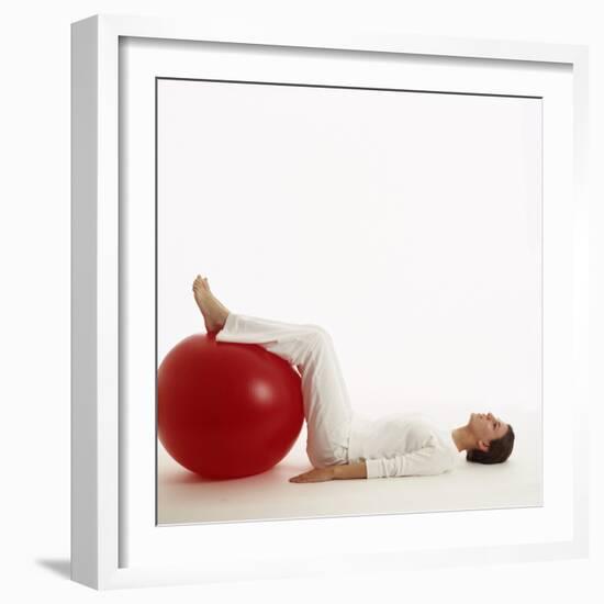 Woman Using An Exercise Ball-Cristina-Framed Premium Photographic Print