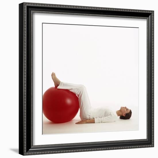 Woman Using An Exercise Ball-Cristina-Framed Premium Photographic Print