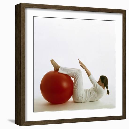 Woman Using An Exercise Ball-Cristina-Framed Premium Photographic Print