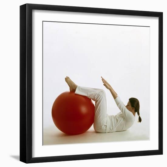 Woman Using An Exercise Ball-Cristina-Framed Premium Photographic Print