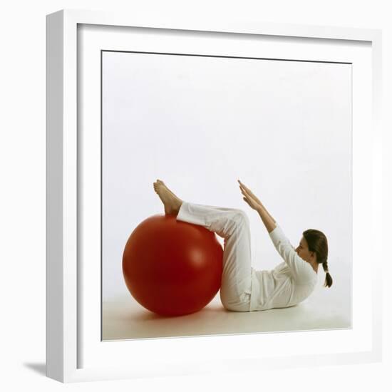 Woman Using An Exercise Ball-Cristina-Framed Premium Photographic Print